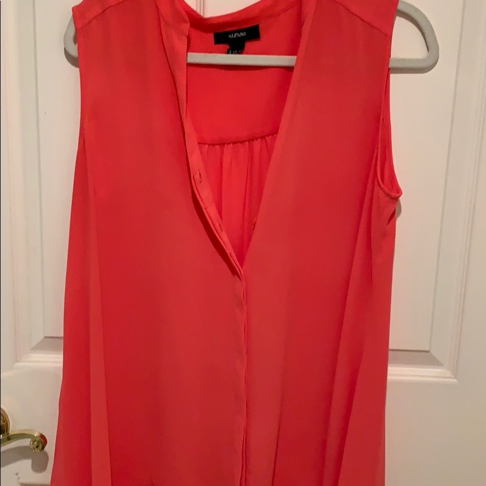 A salmon colored blouse